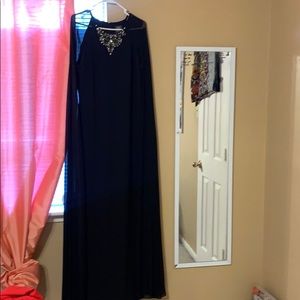 Black maxi dress with black long cape in the back